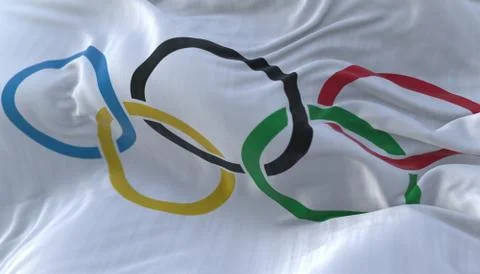 Olympic flag waving at wind with blue sky Stock Illustration