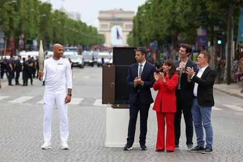 Olympic Flame arrives in Paris ahead of 2024 summer games, France - 14 Jul 2024 Stock Photos