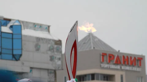 Olympic flame in Siberia, in honor of the 2014 Olympics Stock Footage 33272750