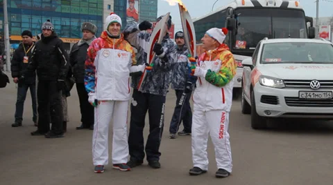 Olympic flame in Siberia, in honor of the 2014 Olympics Stock Footage 33273298