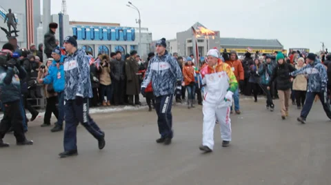 Olympic flame in Siberia, in honor of the 2014 Olympics Stock Footage 33273516