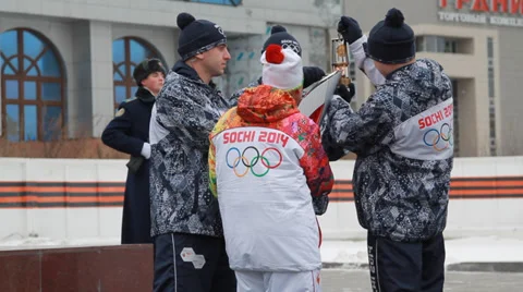 Olympic flame in Siberia, in honor of the 2014 Olympics Stock Footage 33274080