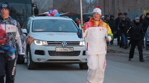 Olympic flame in Siberia, in honor of the 2014 Olympics Stock Footage 33274101
