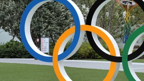 The Olympic logo rings from the statue outside the building Stock Footage 120906932