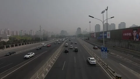 Olympic park and 4th round high road in Beijing in a fog and haze day	 Stock-Footage 88082883