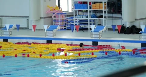 Olympic pool infrastructure training inventory visible lane ropes platforms foam Stock Footage 313593941