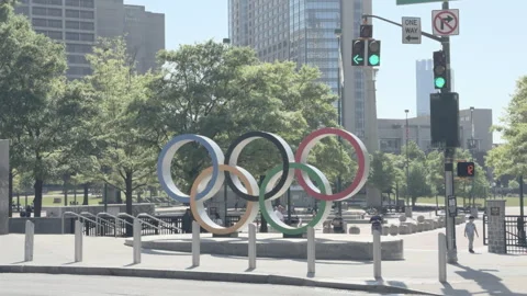 Olympic rings in front of Centennial Park Atlanta 4k Stock Footage 317423120