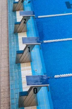 Olympic swimming pool Stock Photos