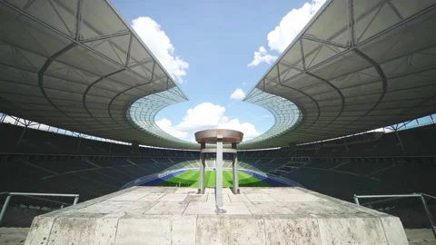 Olympic torch flame at Olympic Stadium in Berlin, empty Olympiastadion. Germany Stock Footage 163778491