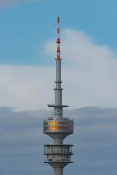 Olympic tower in Munich before cloudy sky Stock Photos