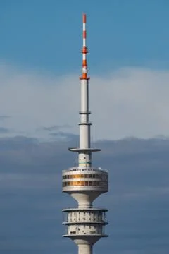 Olympic tower in Munich before cloudy sky Stock Photos