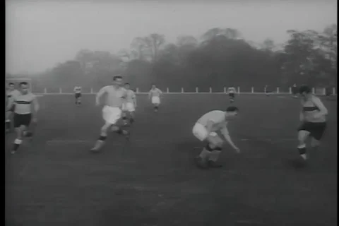 Olympics Soccer match between U.S. armed team and Royal air force team - 1956 Stock Footage 99085567