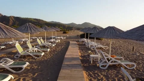 Olympos beach with umbrellas and sunbed Stock Footage 195032572
