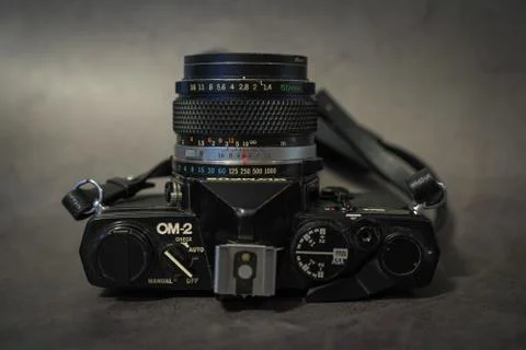 Olympus OM2 on grey background Foto stock