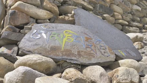 OM MANE PADME HUM Painted Rock Stock Footage 170356598