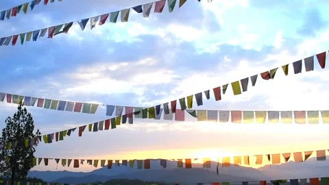Om Mani Padme Hum flags, also known as Tibetan prayer flags Stock Footage 331529726