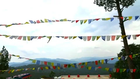 Om Mani Padme Hum flags, also known as Tibetan prayer flags Stock Footage 331529885