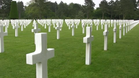 Omaha Beach, Normandy American Cemetery. Pan of the white crosses Video stock 44123953