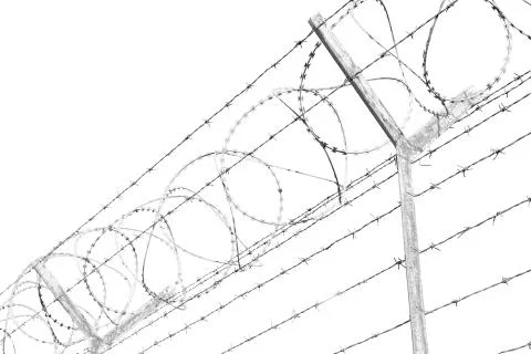 In oman barbwire in the background and cloudy sky Stock Photos