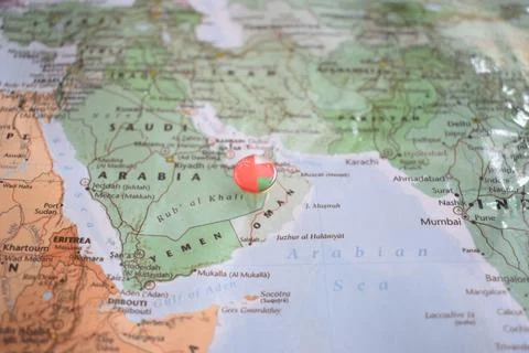 Oman flag drawing pin on the map Stock Photos