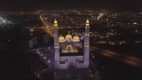 Oman Muscat Mosque minarets night Stock Photos