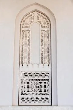 Oman old ornate window pattern at mosque Qaboos Stock Photos