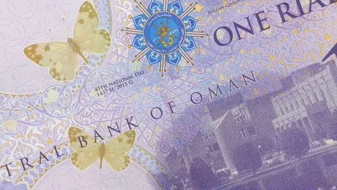 Oman one rial notes macro rotating. Omani currency, money Video stock 104573798