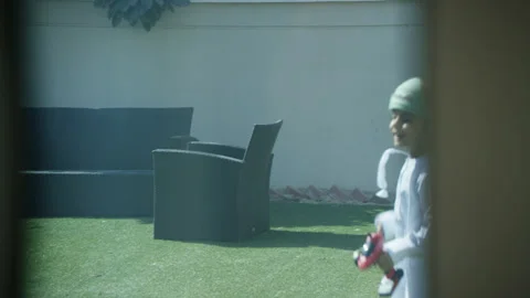 Omani boy playing in the garden. Stock Footage 151283165