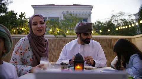Omani family video calling while eating. Stock Footage 152928063