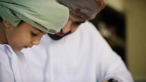 Omani father and son spending time together. Stock Footage 151248043