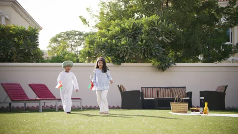 Omani kids running with flags. Stock Footage 151367734