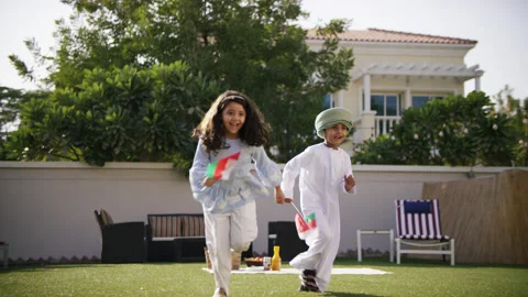 Omani kids running with flags. Stock Footage 151369436