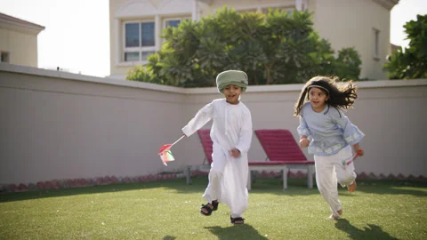 Omani kids running with flags. Stock Footage 151374238
