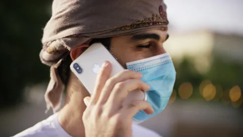 Omani man talking on the phone. Stock Footage 151433380