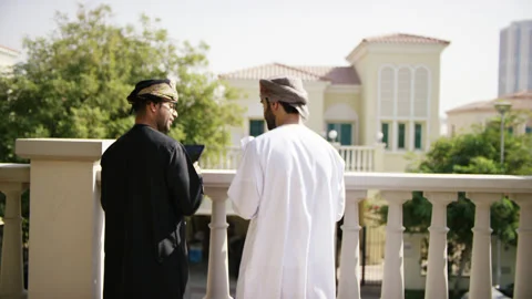 Omani men looking at blue prints. Stock Footage 152725475