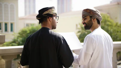 Omani men looking at blue prints. Stock Footage 152734430