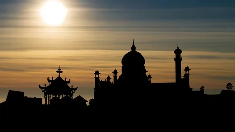 Omar Ali Saifuddin Mosque with Ceremonial Barge in Silhouette at Sunset, Brunei Stock Footage 107749794