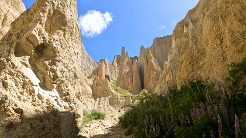 Omarama Clay Cliffs unique landscape with pinnacles, deep ravines, and shar.. Stock Footage 295011382