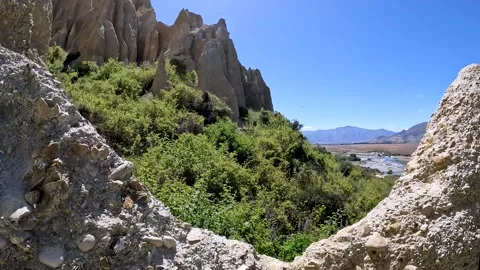 Omarama Clay Cliffs unique landscape with pinnacles, deep ravines, and shar.. Stock Footage 295011443