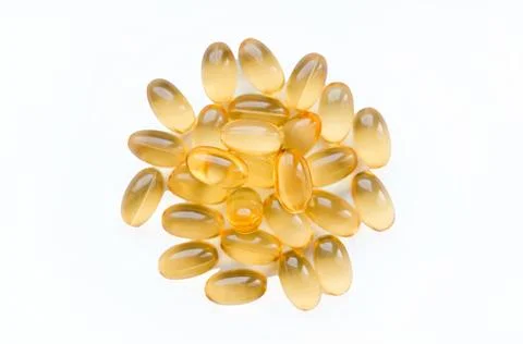 Omega-3 capsules on a white background. Polyunsaturated fatty acids. The concept Stock Photos