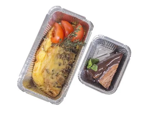 Omelet and dessert. Stock Photos