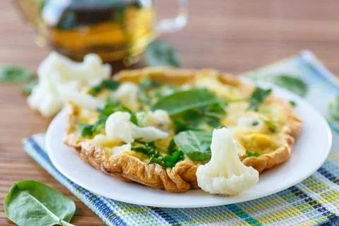 Omelet with cauliflower Stock Photos