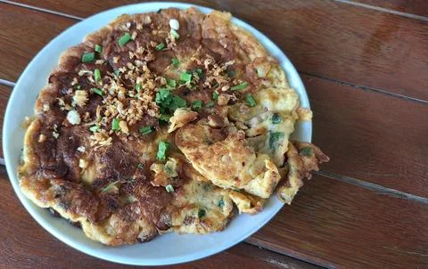 The omelet is crispy on the outside and soft on the inside. Stock Photos