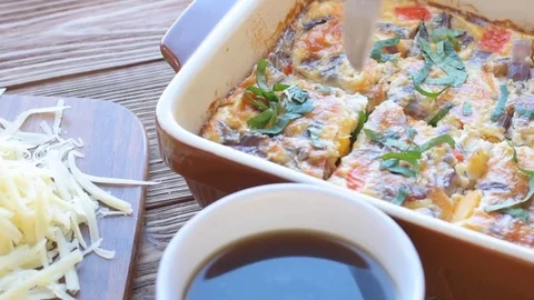 Omelet with ham and cheese in a baking form. Breakfast. 動画素材 70415150