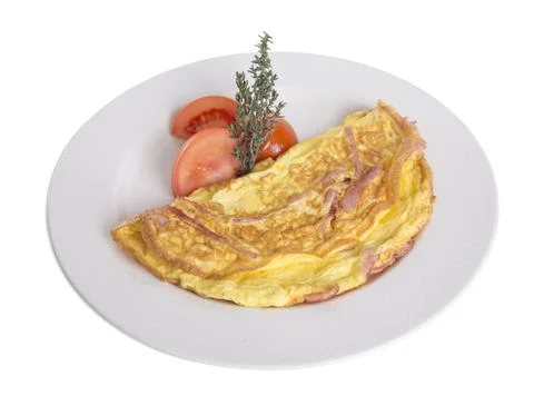 Omelet with ham and tomatoes. Stock Photos