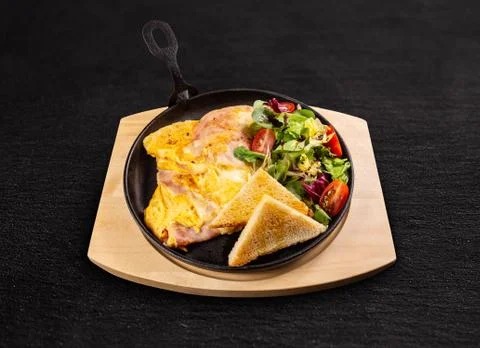 Omelet with ham Stock Photos
