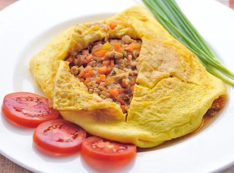 Omelet with herbs Stock Photos