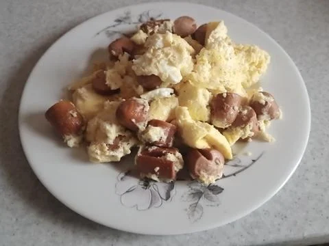 Omelet with sausages Stock Photos