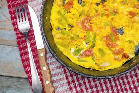 Omelet with vegetables in pot. Stock Photos