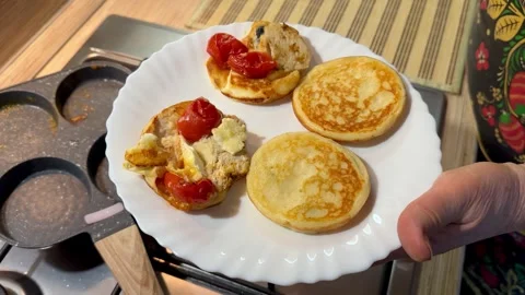 Omelets are expertly prepared in a unique special frying pan. At the moment Stock Footage 304827100